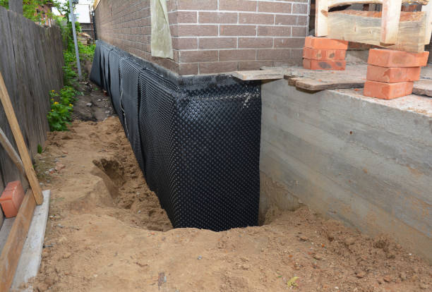 Happy homeowners after waterproofing job in Clarendon Hills